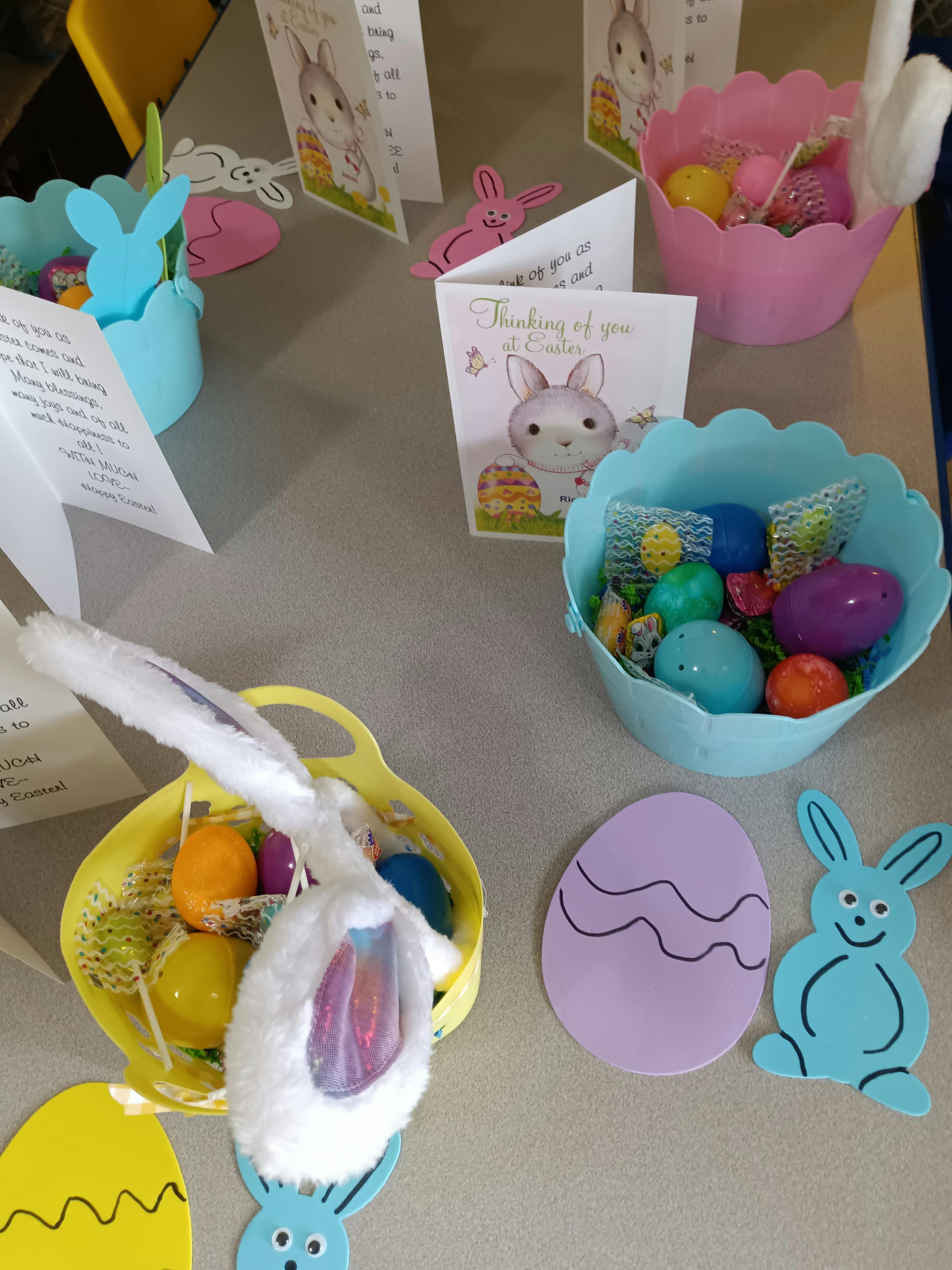 Easter decorations with bunny cards, baskets, and eggs