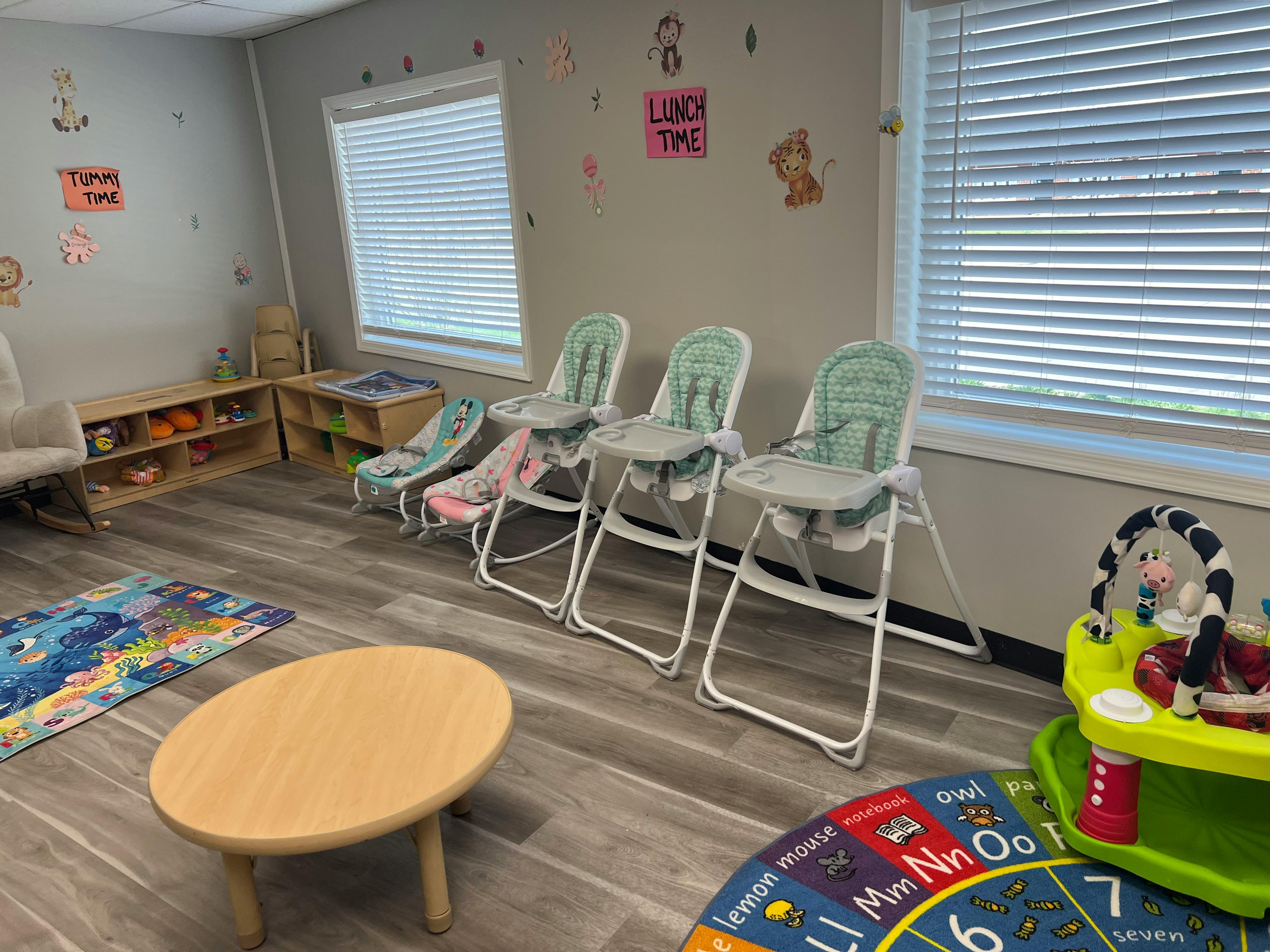 High chairs and infant seats in a room