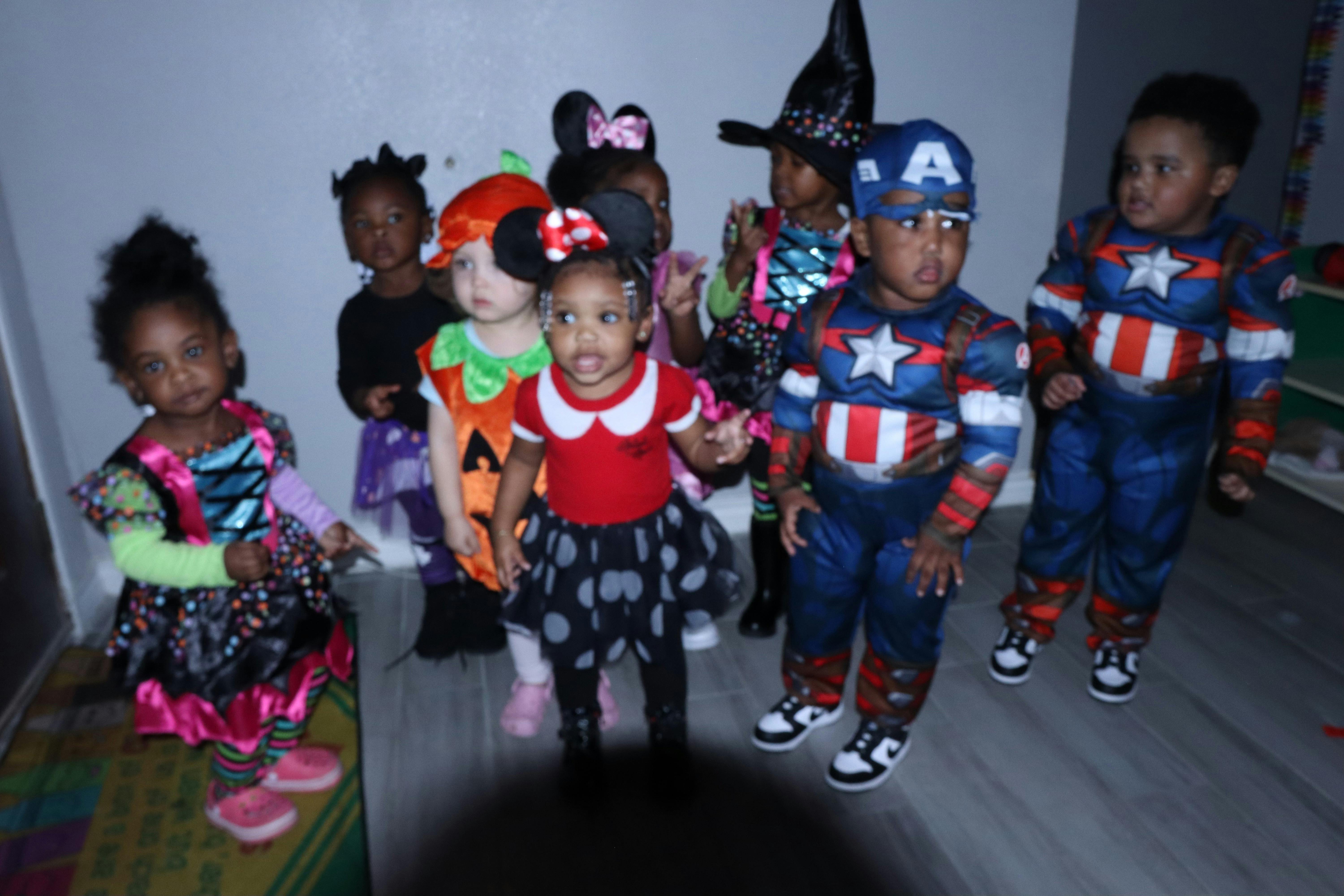 Group of children in Halloween costumes