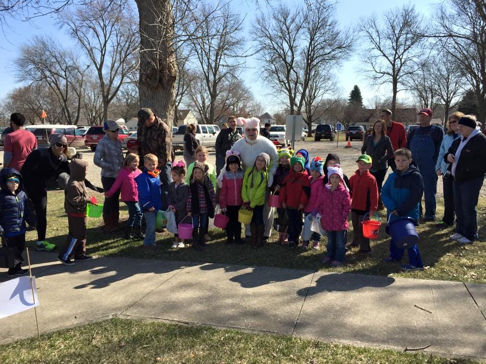 Group of adults and children gathered outdoors