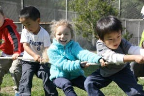 Children playing tug of war
