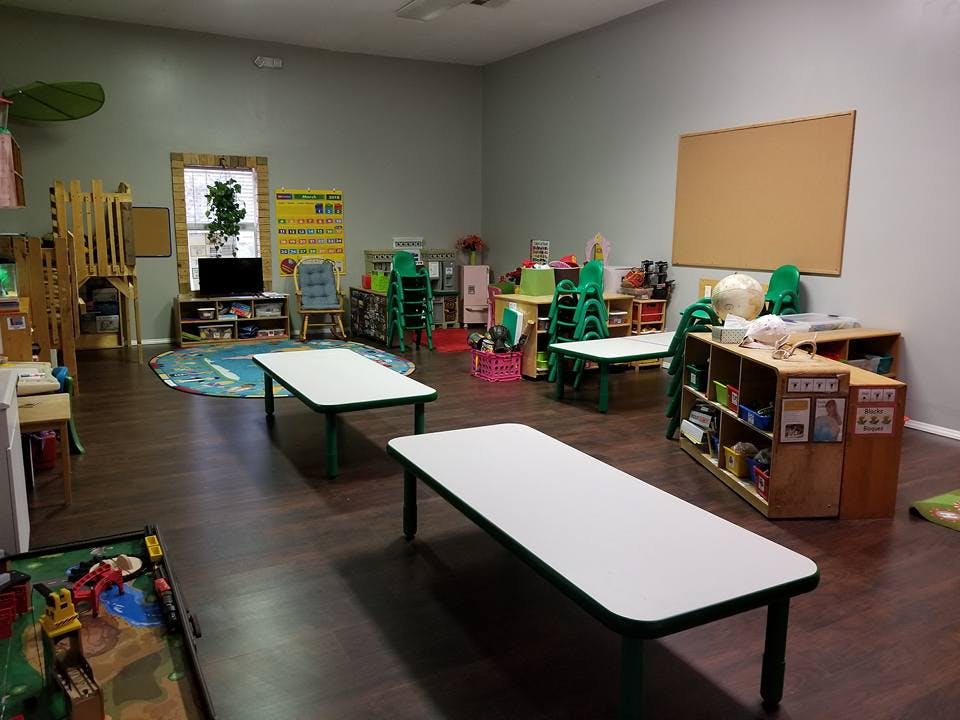 Classroom with small tables and chairs
