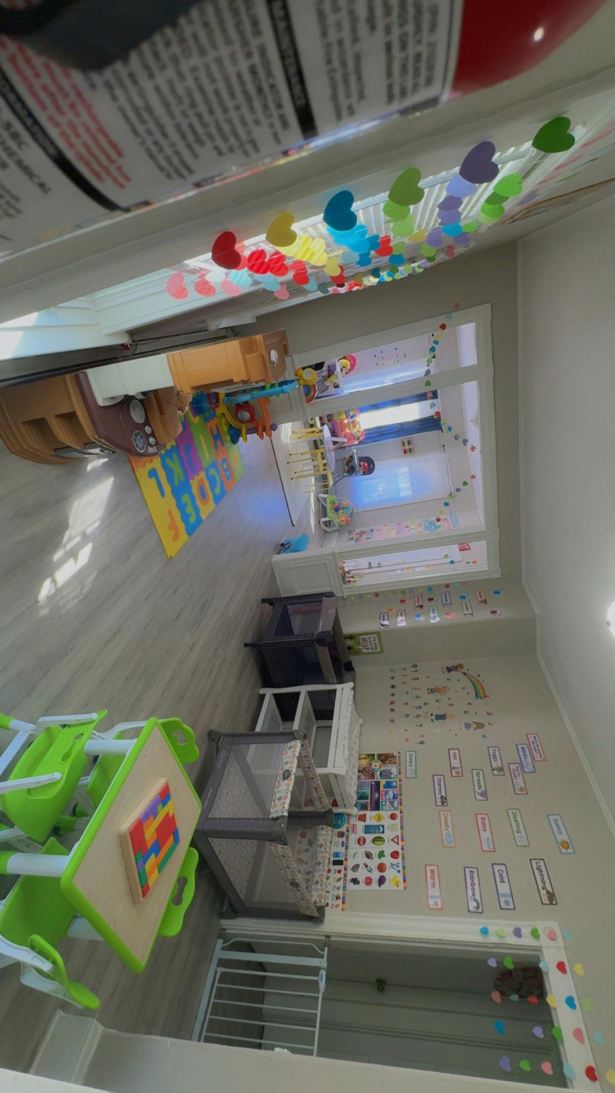 A classroom with colorful decorations and learning materials