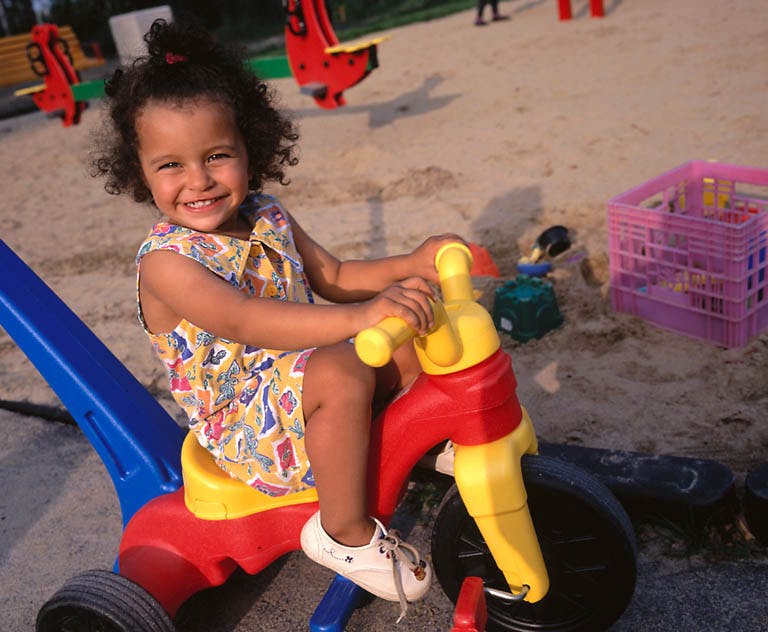 Child on a tricycle