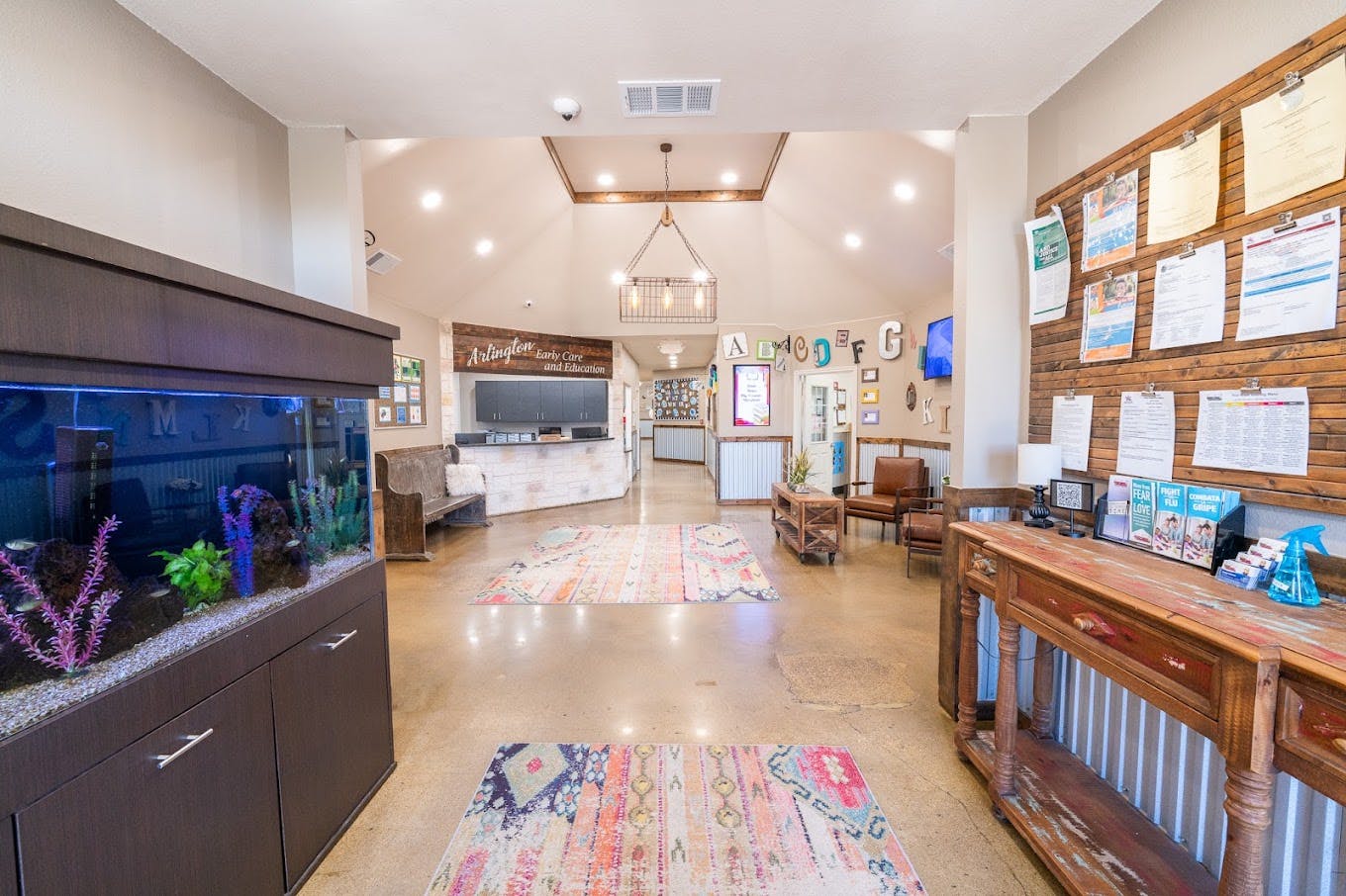 Reception area of Arlington Early Care and Education with a large fish tank