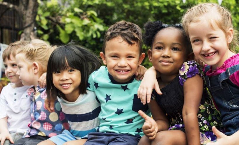 Group of children sitting together