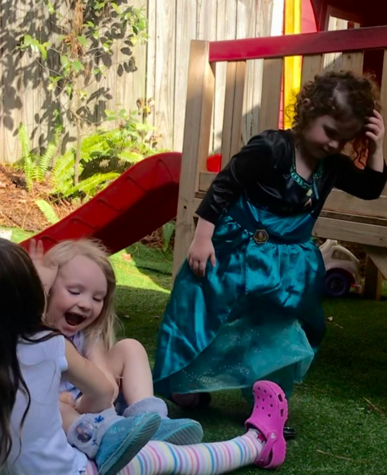 Children playing in a backyard
