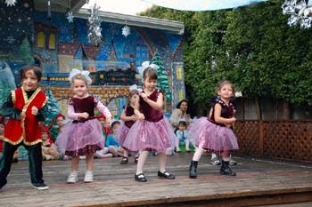Children performing on a stage