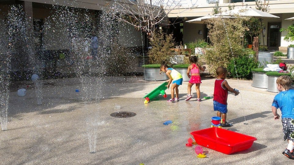 Children playing in a splash pad